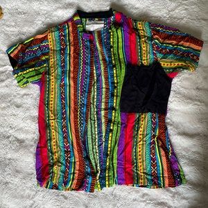 Super cool and fun button down. I only wore it once and had my fun with it.